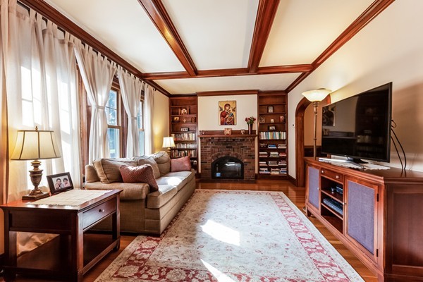 104 Cutter Hill Road Arlington, MA 02474 - Photo 4 of 19 a living room with furniture and a flat screen tv