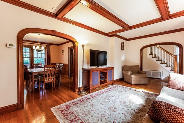 104 Cutter Hill Road Arlington, MA 02474 - Photo 5 of 19 a living room with furniture and a flat screen tv