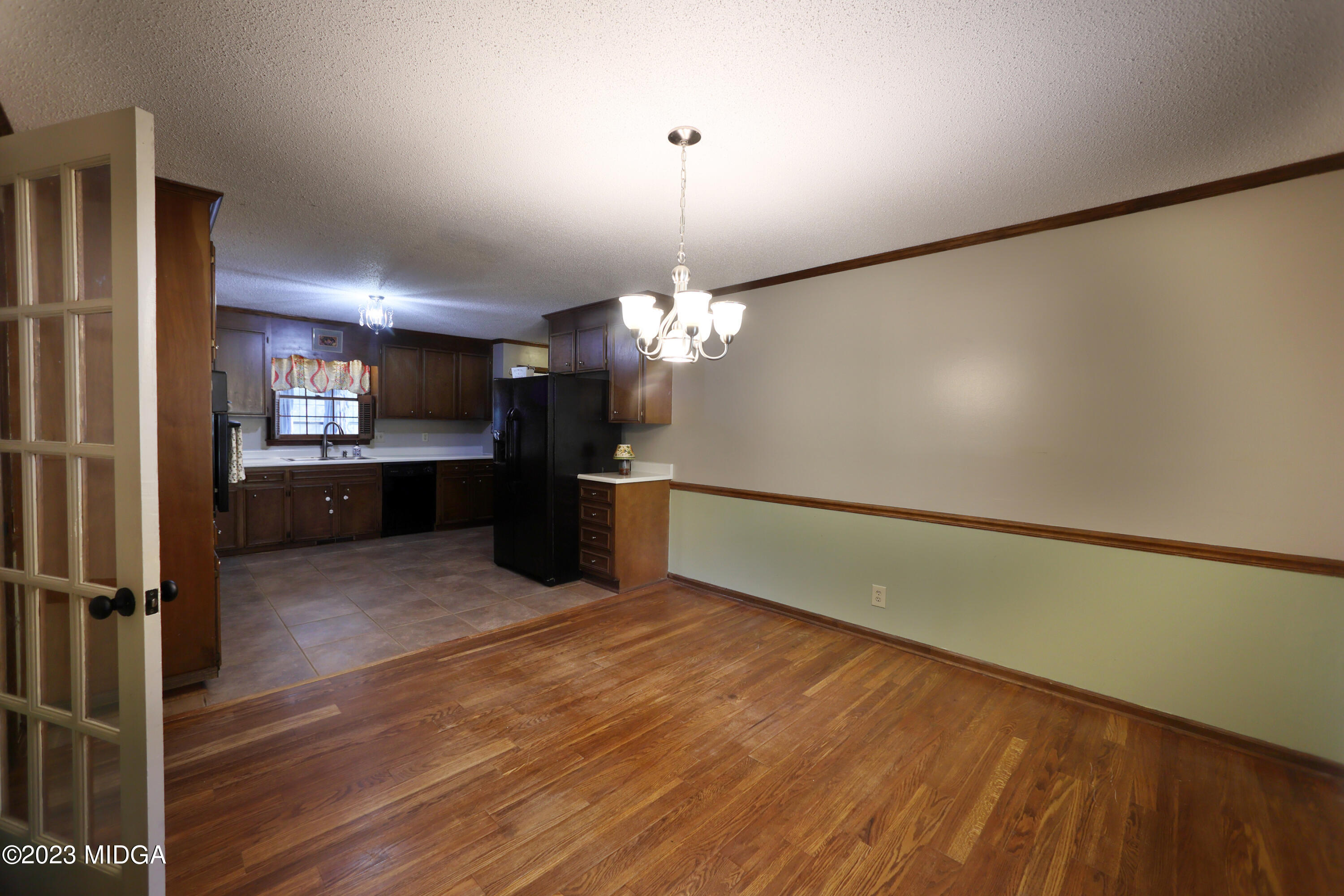 5740 Huddersfield Road Macon, GA 31210 - Photo 18 of 36 a view of a kitchen with a sink wooden floor and kitchen