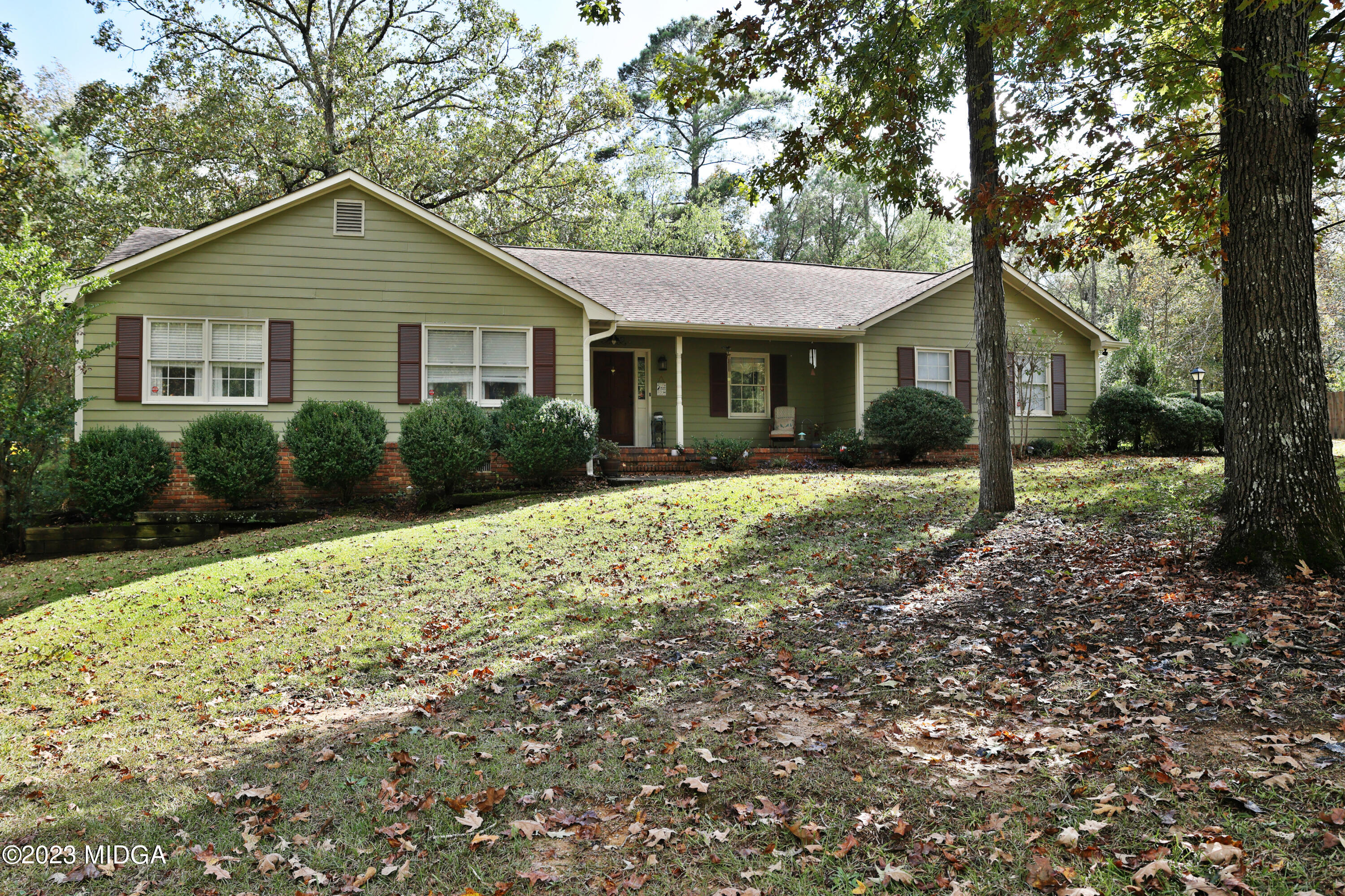 5740 Huddersfield Road Macon, GA 31210 - Photo 2 of 36 a front view of a house with yard and green space