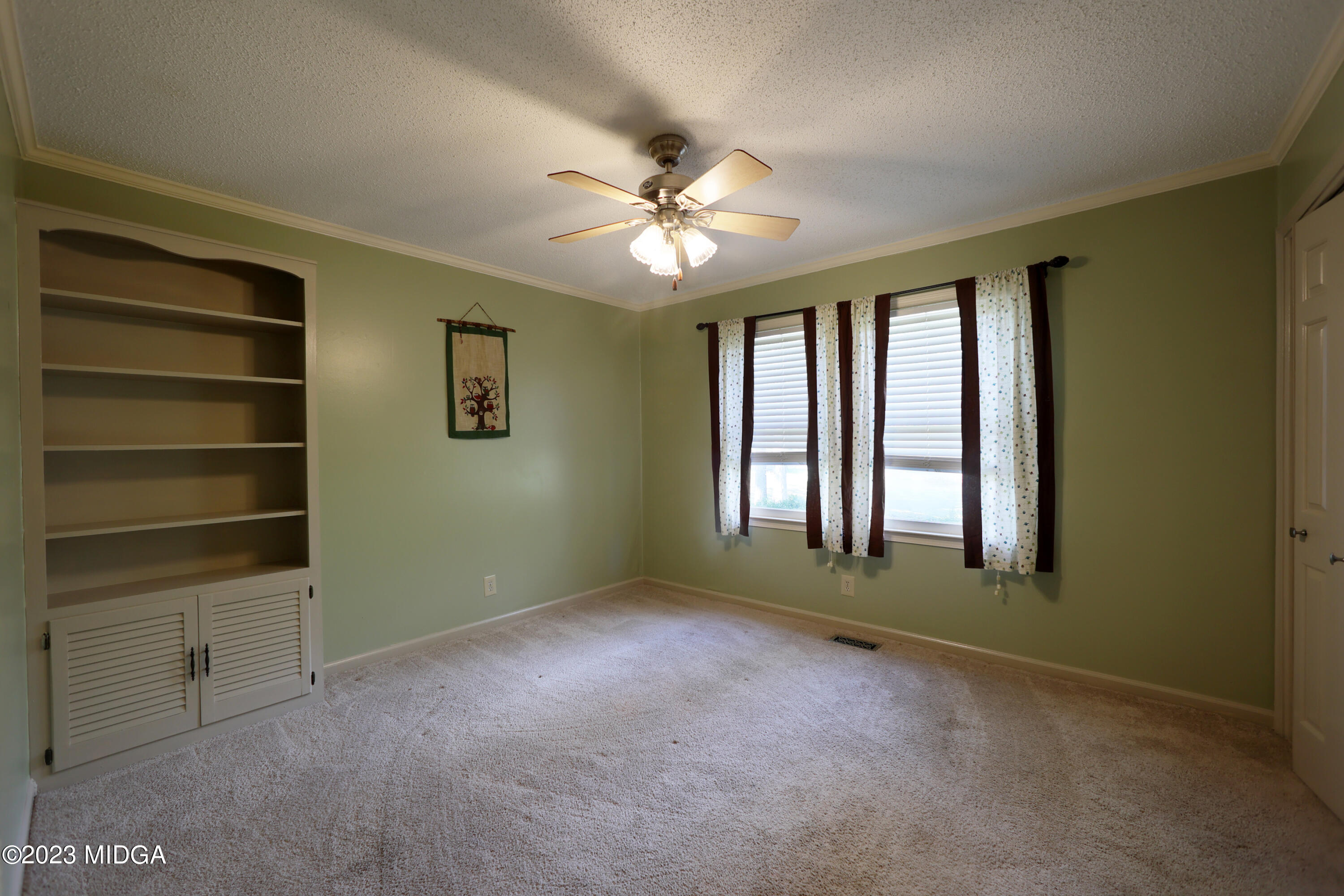 5740 Huddersfield Road Macon, GA 31210 - Photo 27 of 36 a view of an empty room with a window