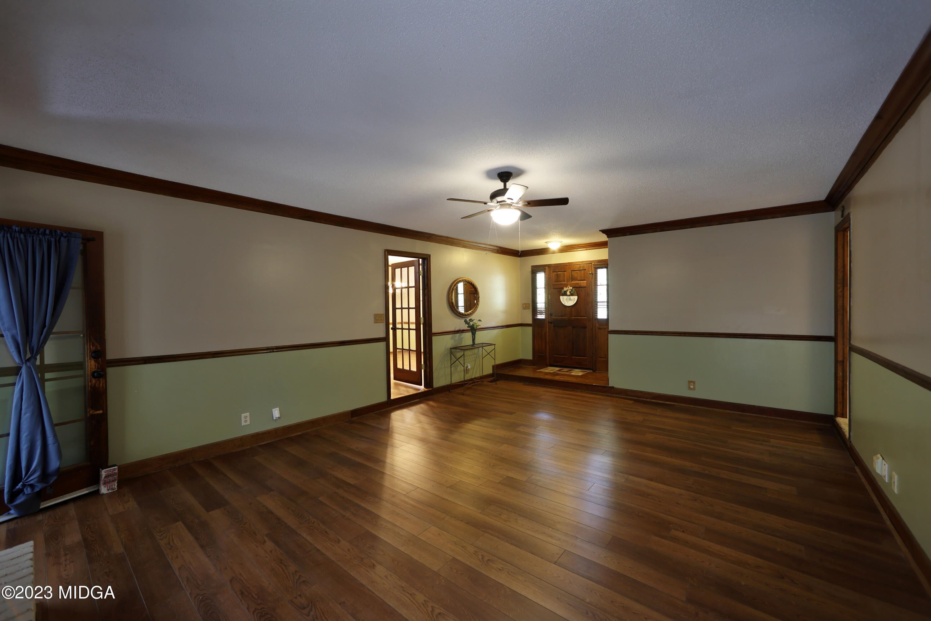 5740 Huddersfield Road Macon, GA 31210 - Photo 7 of 36 a view of a livingroom with wooden floor