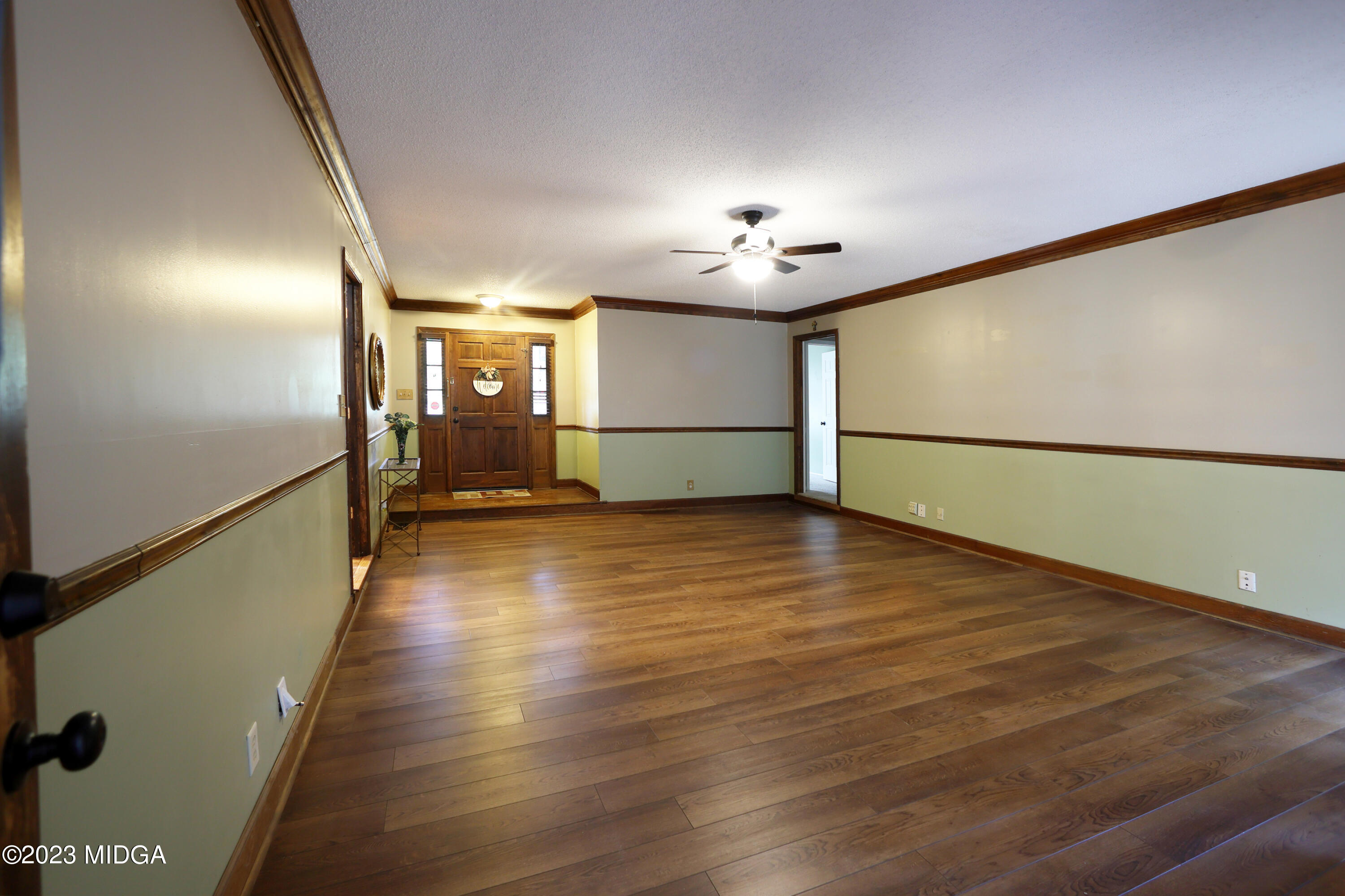 5740 Huddersfield Road Macon, GA 31210 - Photo 8 of 36 a view of a room with wooden floor