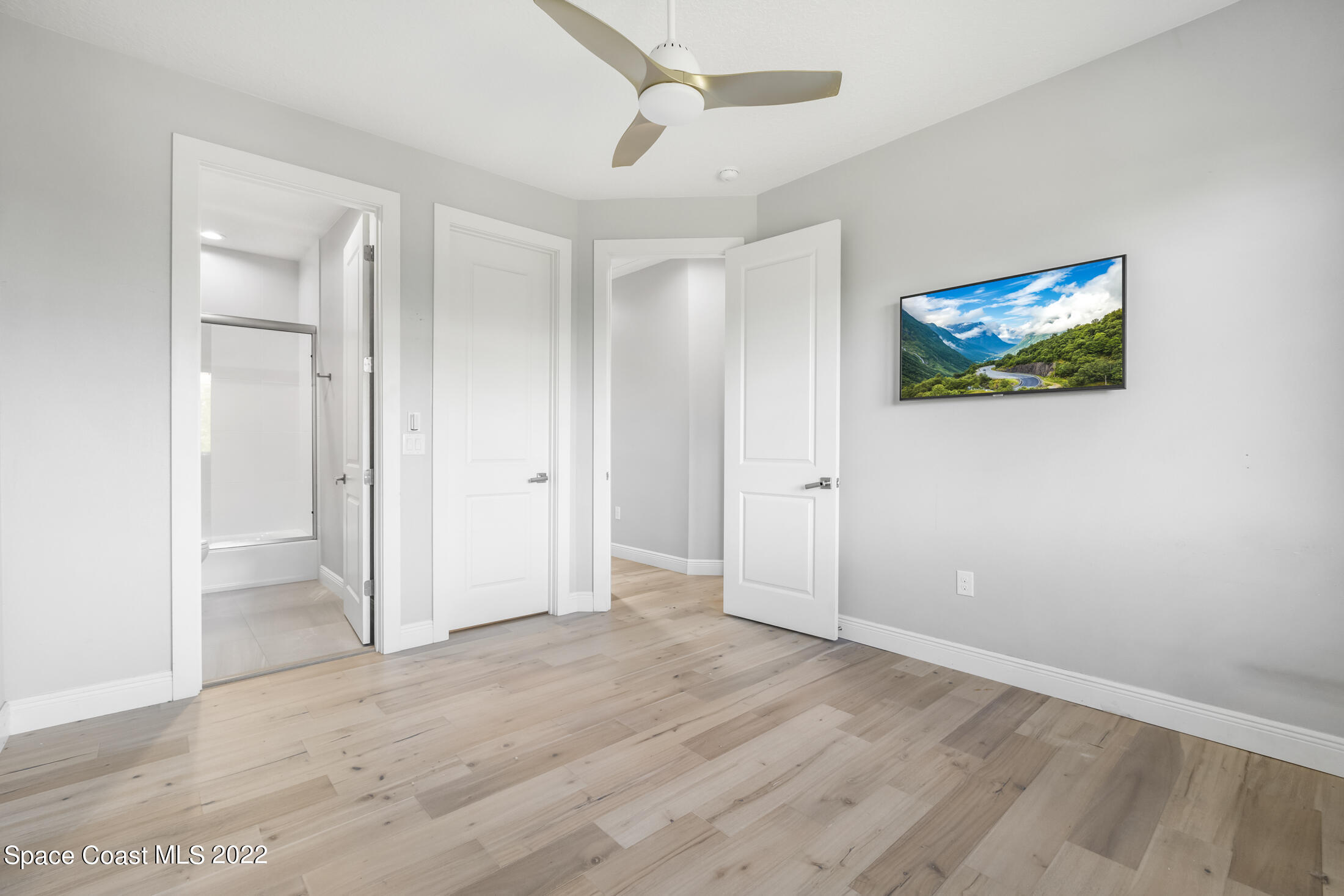 151 24th Street Cocoa Beach, FL 32931 - Photo 22 of 36 wooden floor in an empty room