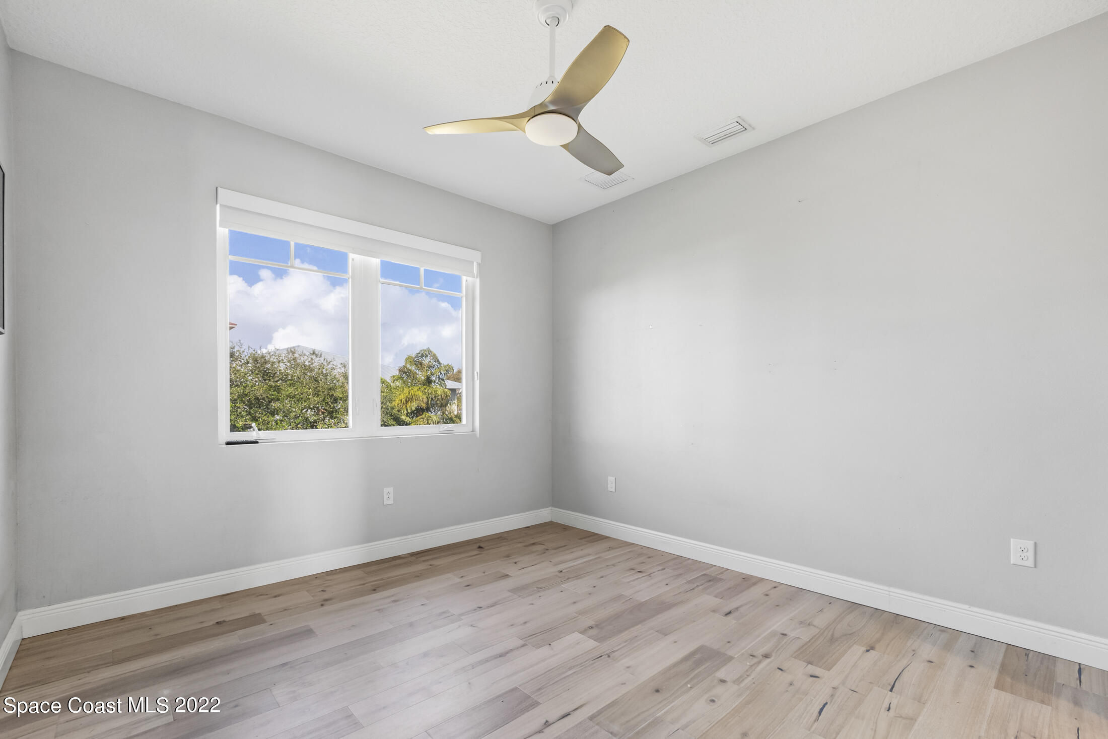 151 24th Street Cocoa Beach, FL 32931 - Photo 23 of 36 an empty room with a window