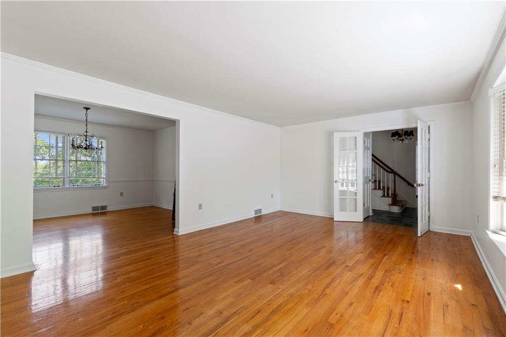 24 Oakglen Drive Oakmont, PA 15139 - Photo 18 of 50 an empty room with wooden floor and a window