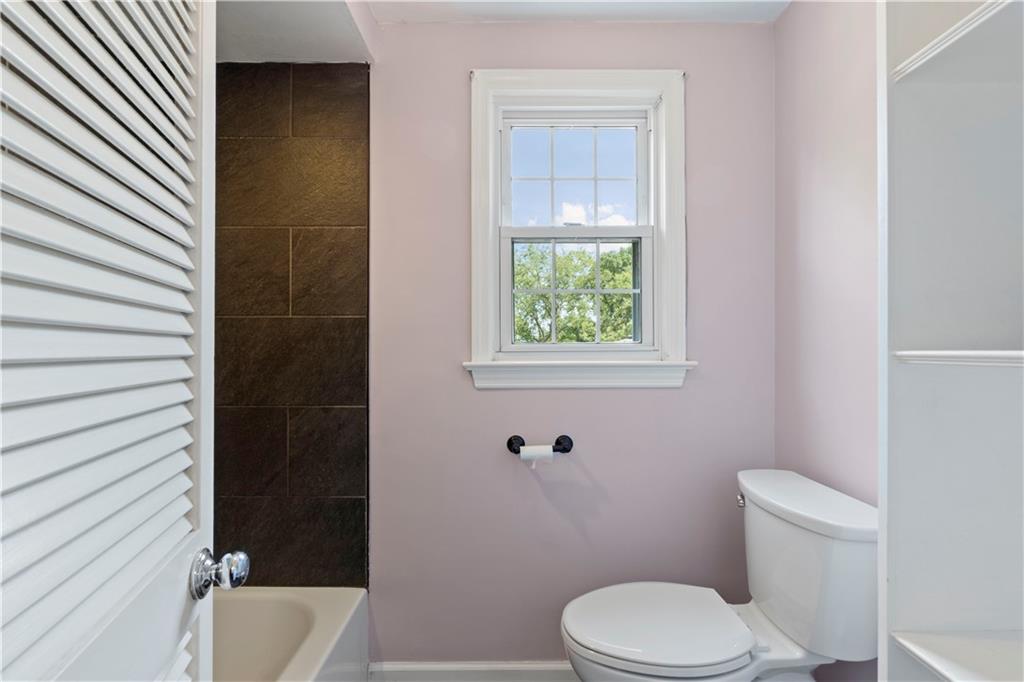 24 Oakglen Drive Oakmont, PA 15139 - Photo 27 of 50 a white toilet sitting next to a bath tub