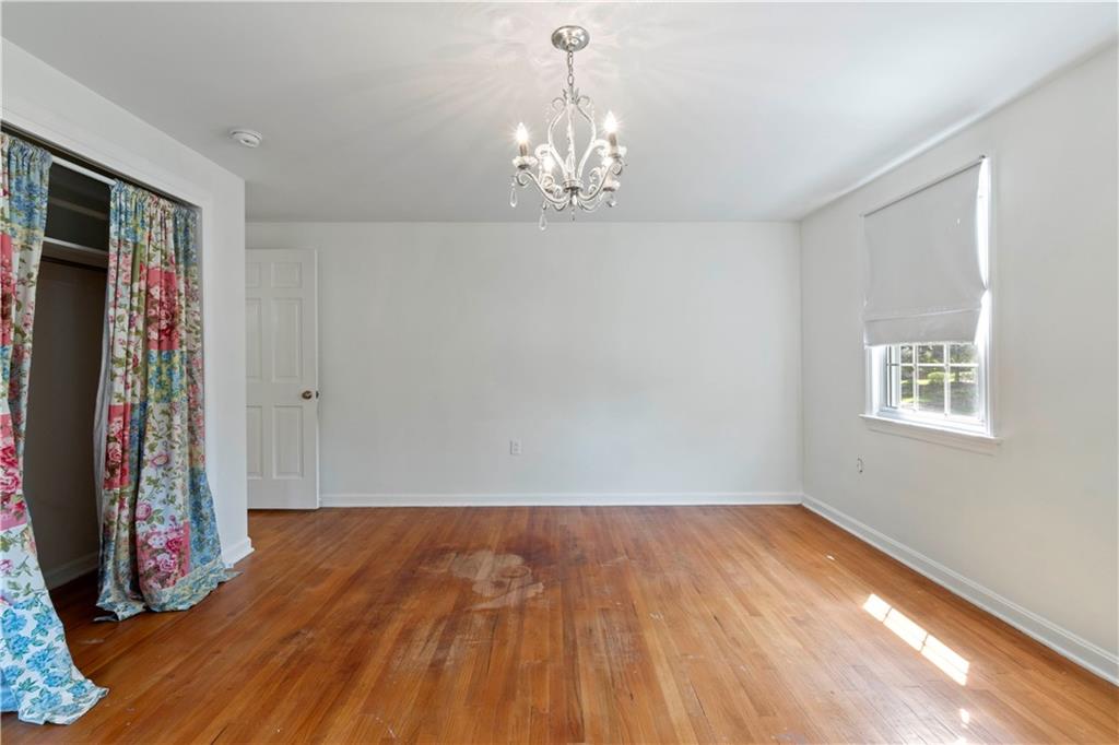 24 Oakglen Drive Oakmont, PA 15139 - Photo 33 of 50 a view of a room with wooden floor and window