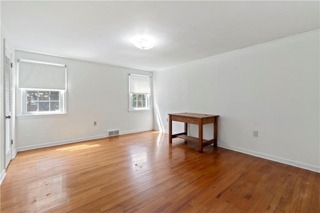 24 Oakglen Drive Oakmont, PA 15139 - Photo 34 of 50 a view of a livingroom with wooden floor and a window