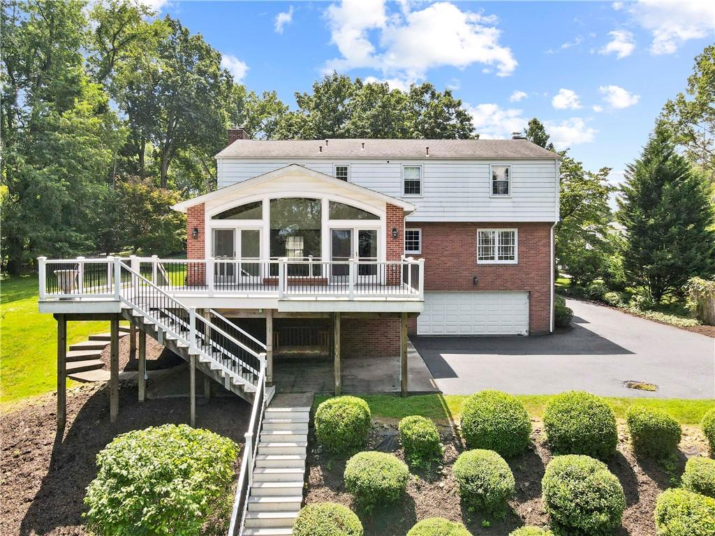 24 Oakglen Drive Oakmont, PA 15139 - Photo 43 of 50 a view of a house with pool and chairs
