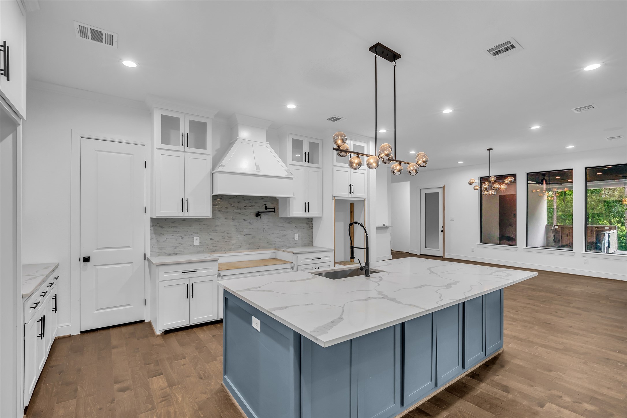 2 Deer Ridge Estates Boulevard Houston, TX 77339 - Photo 5 of 25 Kitchen needs appliances; huge island countertop with sink.