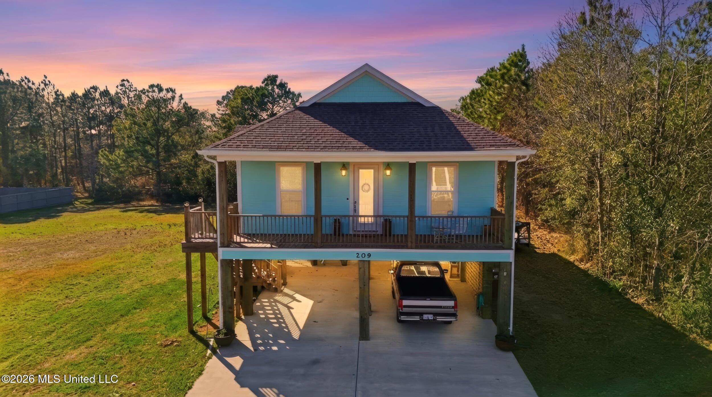 209 White Harbor Road Long Beach, MS 39560 - Photo 1 of 37 2_032_dji_20260223150211_0251_d_twilight