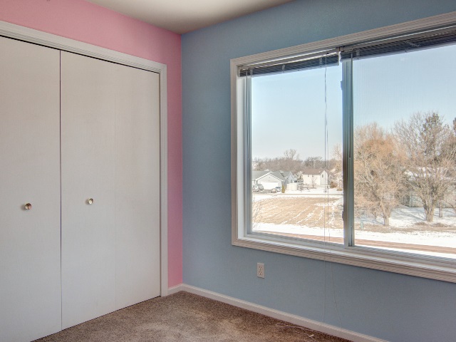 306 Rochester Road Northeast Poplar Grove, IL 61065 - Photo 23 of 25 a view of a room that has a large window
