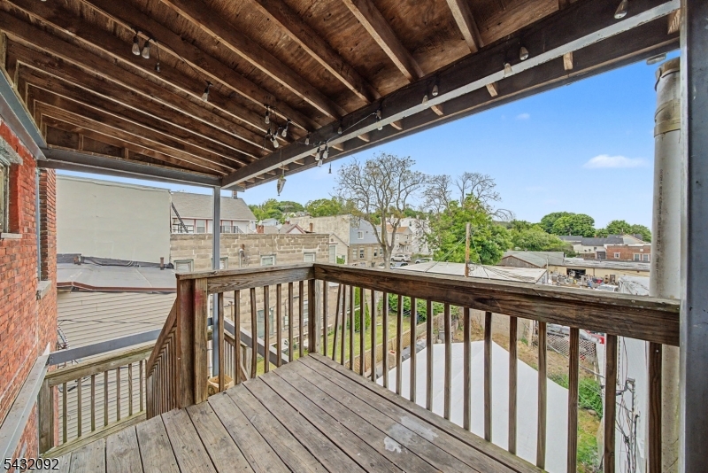 309 Main Street, Unit 3 Boonton, NJ 07005 - Photo 13 of 17 a view of balcony with wooden floor