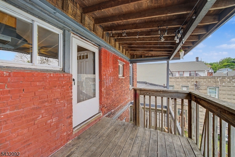 309 Main Street, Unit 3 Boonton, NJ 07005 - Photo 14 of 17 a view of balcony with wooden floor