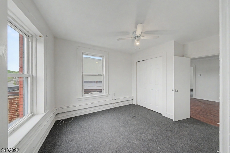 309 Main Street, Unit 3 Boonton, NJ 07005 - Photo 6 of 17 a view of an empty room with a window