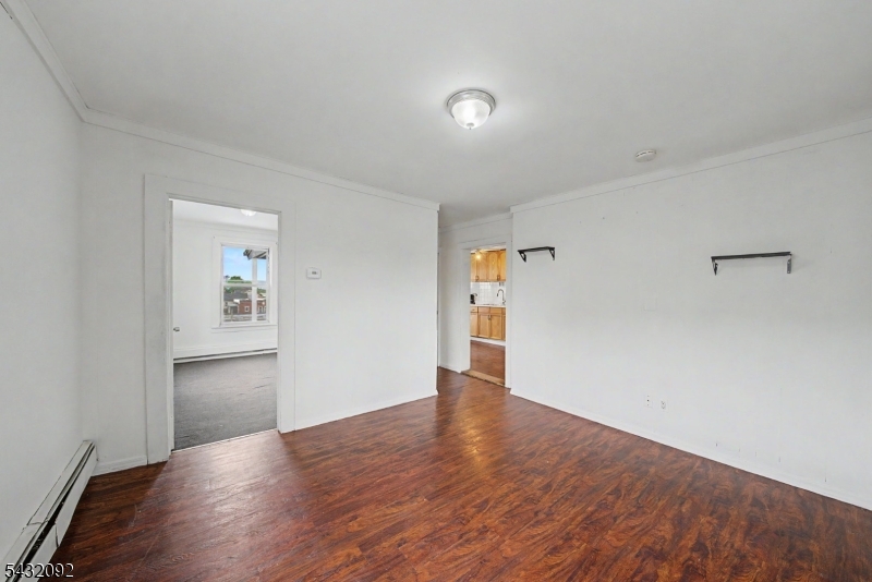 309 Main Street, Unit 3 Boonton, NJ 07005 - Photo 8 of 17 a view of empty room with wooden floor