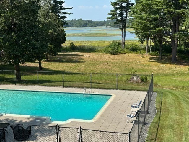 26 Mordecai Lincoln Road Scituate, MA 02066 - Photo 17 of 36 a view of a swimming pool with a patio
