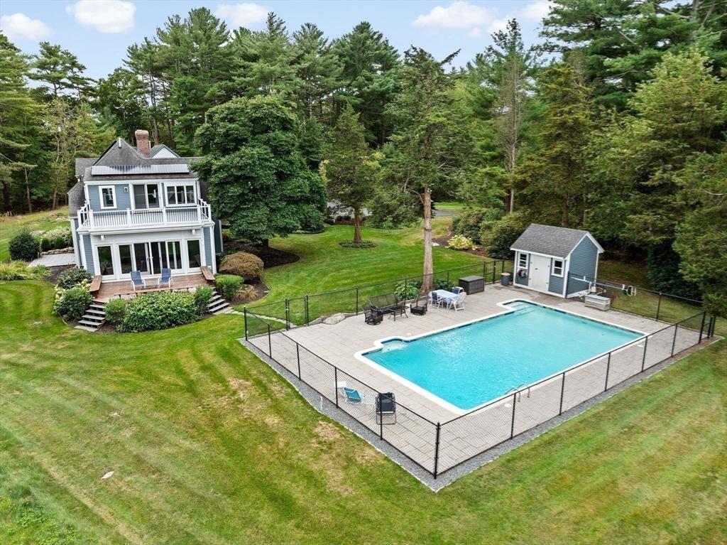 26 Mordecai Lincoln Road Scituate, MA 02066 - Photo 20 of 36 a view of a house with pool and chairs