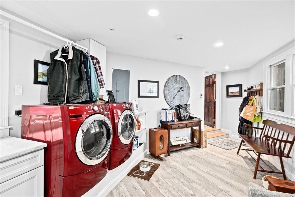 26 Mordecai Lincoln Road Scituate, MA 02066 - Photo 27 of 36 a view of a bedroom with furniture washer and dryer
