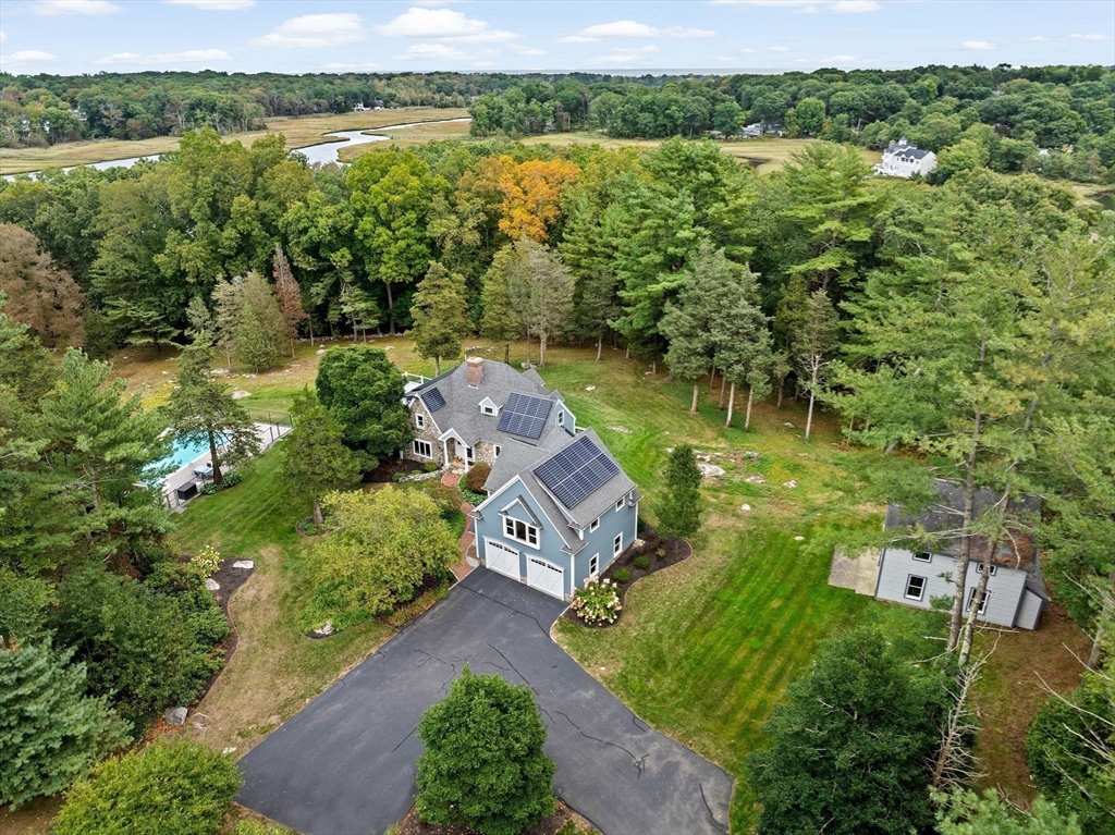 26 Mordecai Lincoln Road Scituate, MA 02066 - Photo 4 of 36 an aerial view of a house with a yard and lake view