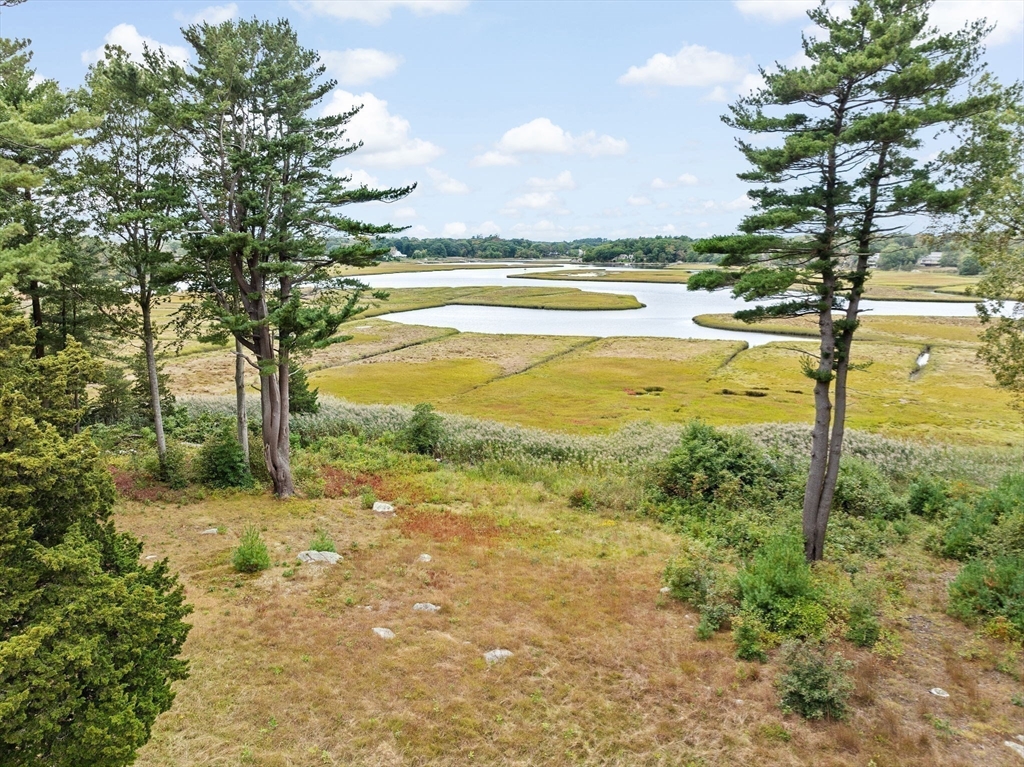 26 Mordecai Lincoln Road Scituate, MA 02066 - Photo 8 of 36 a view of an ocean beach