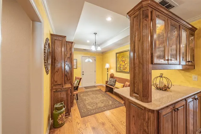 a kitchen with a sink counter top space and stainless steel appliances
