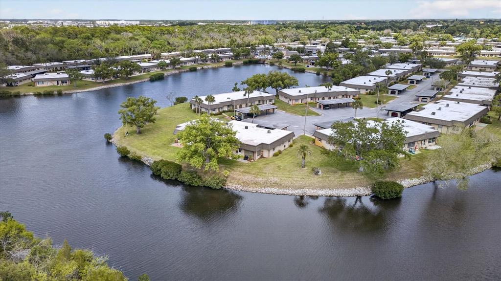 4116 Hampton Drive New Port Richey, FL 34652 - Photo 2 of 35 an aerial view of residential houses with outdoor space
