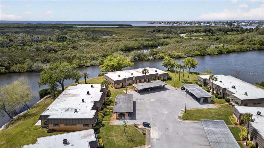 4116 Hampton Drive New Port Richey, FL 34652 - Photo 27 of 35 an aerial view of a house with a lake view