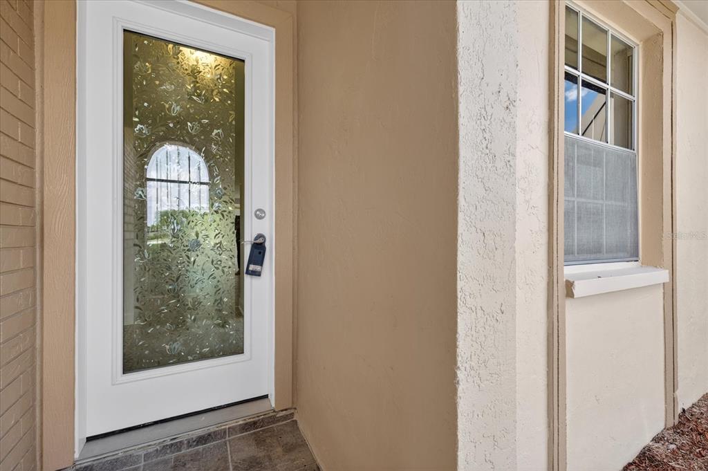 4116 Hampton Drive New Port Richey, FL 34652 - Photo 3 of 35 a view of a glass door