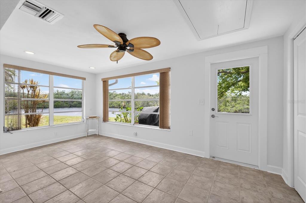 4116 Hampton Drive New Port Richey, FL 34652 - Photo 8 of 35 a view of room with window and a ceiling fan