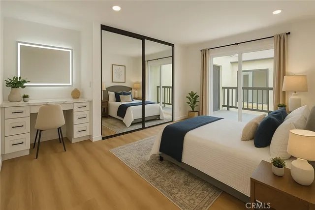 a bedroom with a bed and a desk