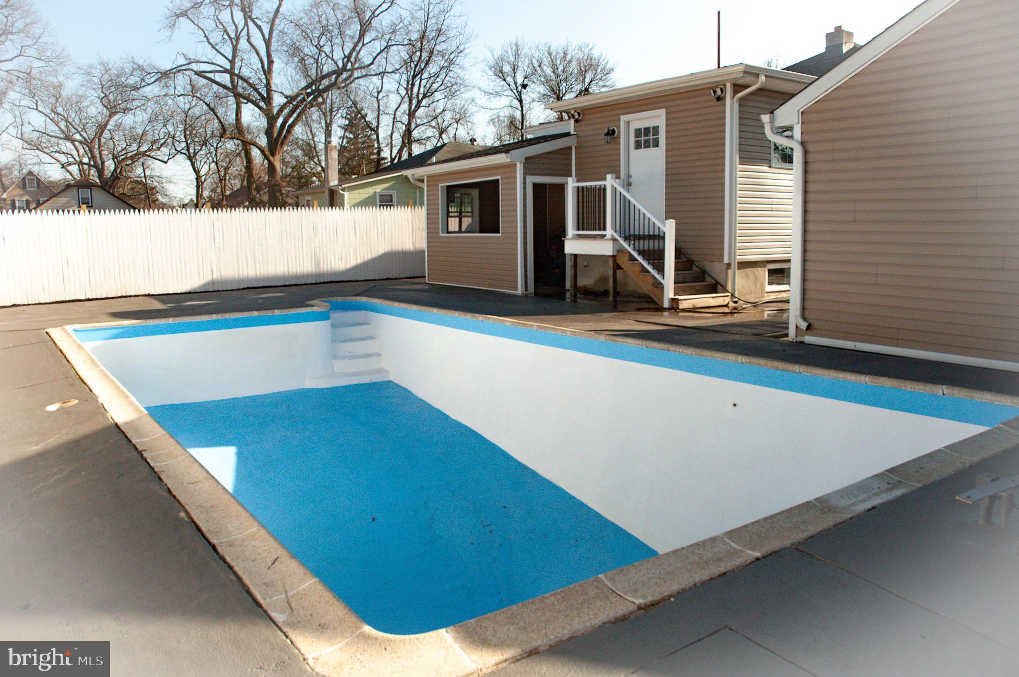 715 Kossuth Street Riverside, NJ 08075 - Photo 6 of 26 view of pool, back door deck and pool house