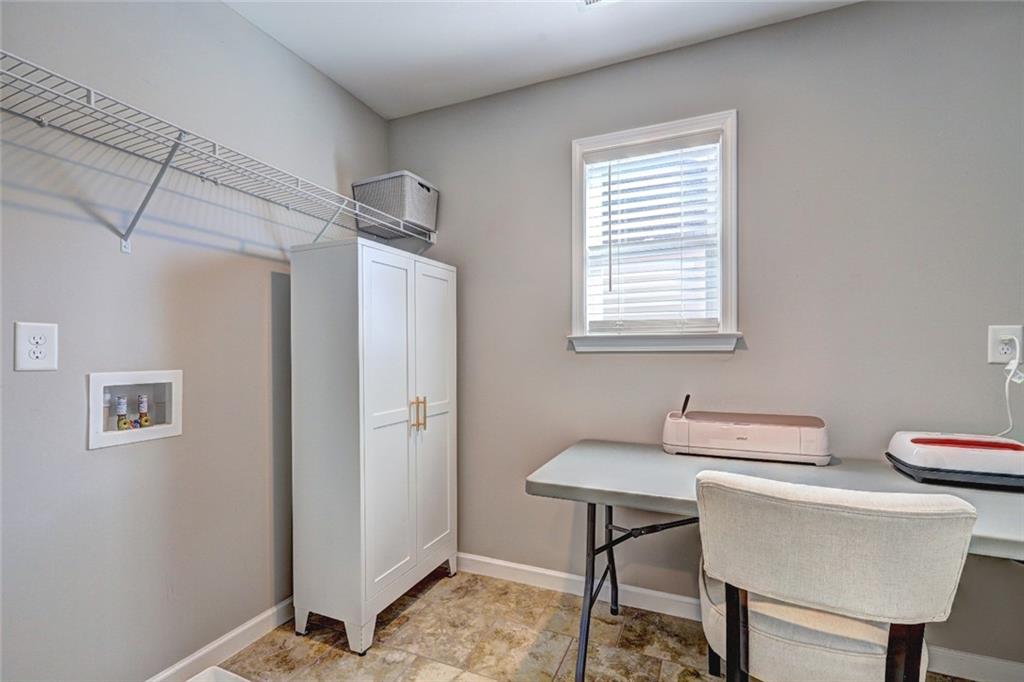 4371 Thacker Lane Suwanee, GA 30024 - Photo 22 of 52 a view of a workspace with furniture