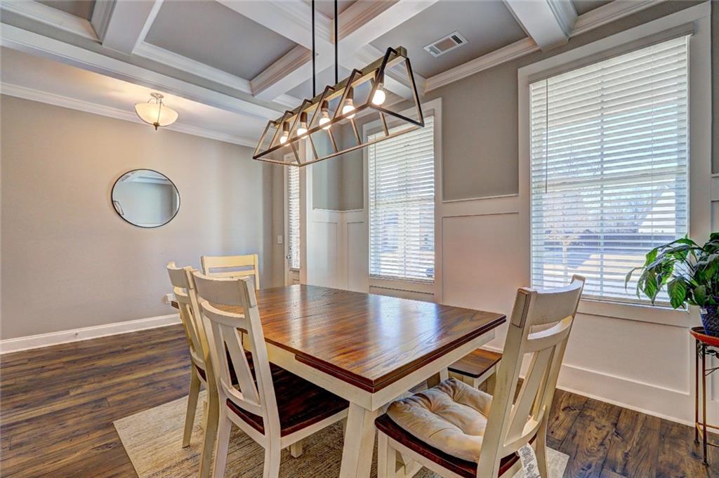 4371 Thacker Lane Suwanee, GA 30024 - Photo 3 of 52 a view of a dining room with furniture and a window