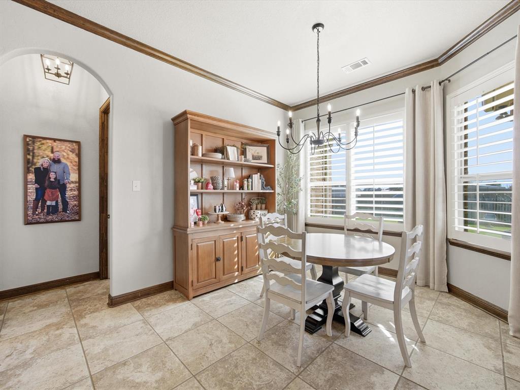 105 Mesquite Court Decatur, TX 76234 - Photo 12 of 36 Dining nook that overlooks the back yard