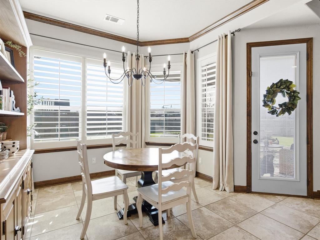 105 Mesquite Court Decatur, TX 76234 - Photo 13 of 36 Beautiful plantation shutters adorn all the windows
