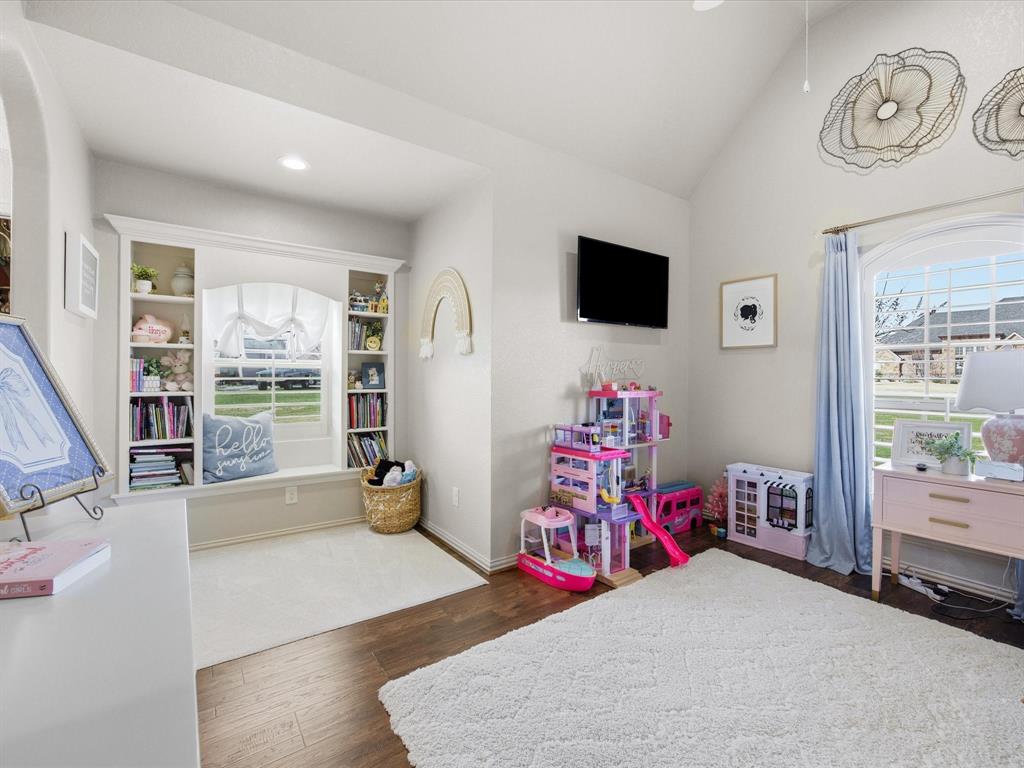 105 Mesquite Court Decatur, TX 76234 - Photo 26 of 36 with a window seat and custom book shelves