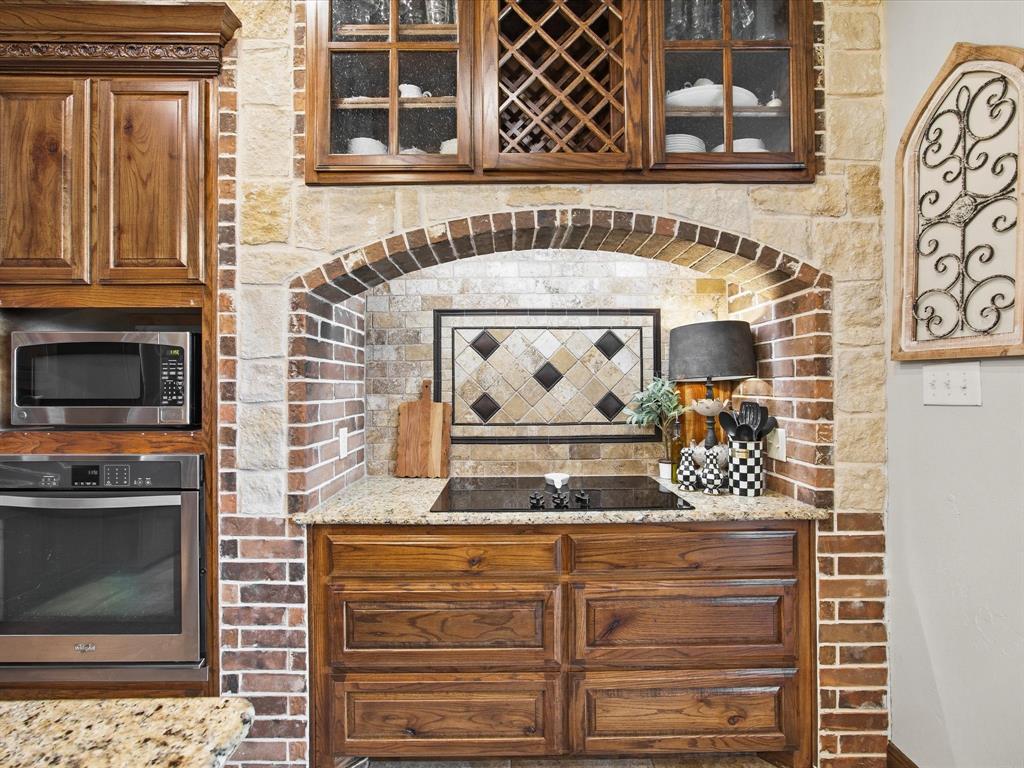 105 Mesquite Court Decatur, TX 76234 - Photo 10 of 36 Electric cook top with drawers underneath for storage