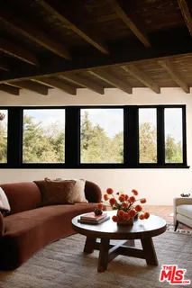 a view of a swimming pool with a yard