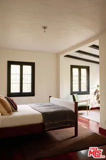 a room with furniture and window