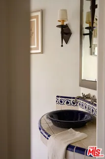 a view of a sink and a mirror