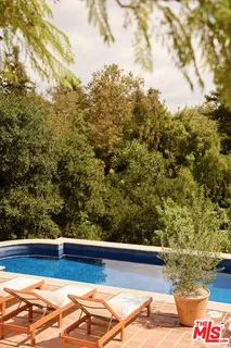 a table and chairs in a patio