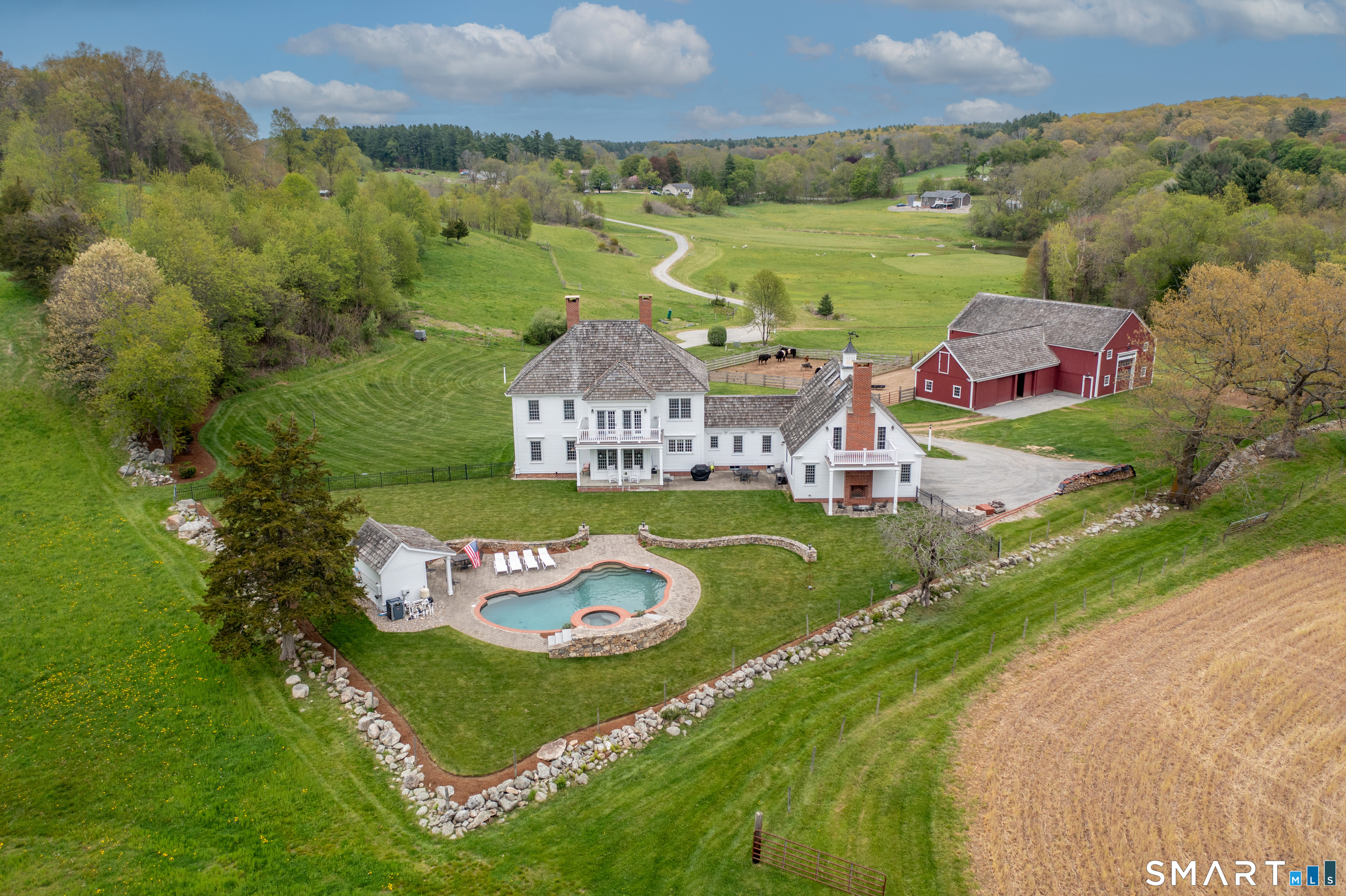 155 Paine Road Woodstock, CT 06281 - Photo 1 of 40 an aerial view of residential houses with outdoor space and street view
