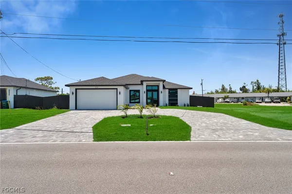 a house with yard in front of it