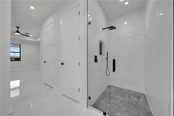 a view of a bathroom with shower