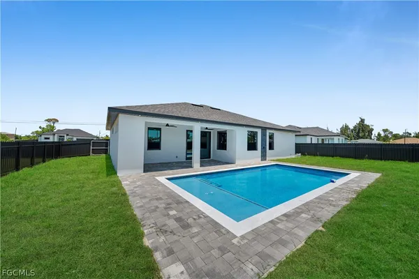a view of outdoor space yard and swimming pool