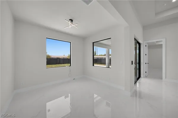 a view of a room that has a window