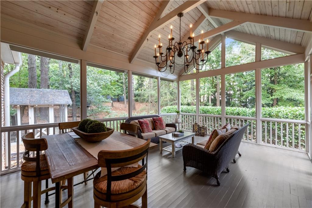 4220 Exeter Close Northwest Atlanta, GA 30327 - Photo 20 of 61 a view of a dining room with furniture window and outside view