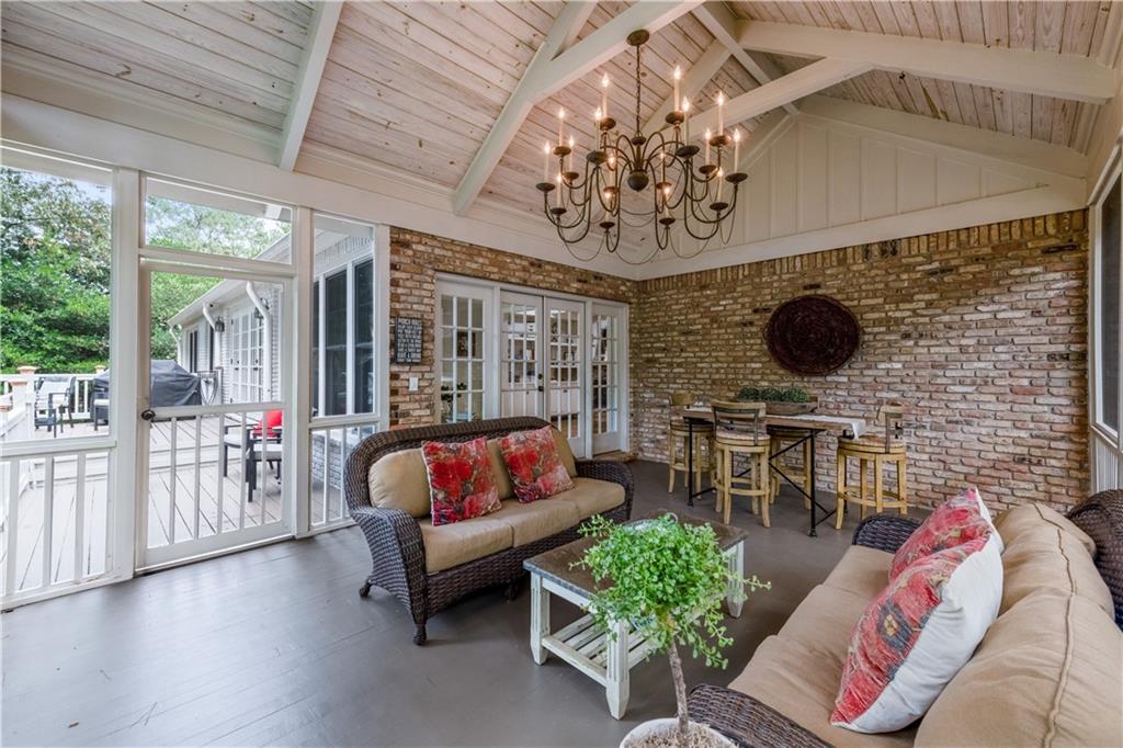 4220 Exeter Close Northwest Atlanta, GA 30327 - Photo 21 of 61 a bedroom with furniture and a large window